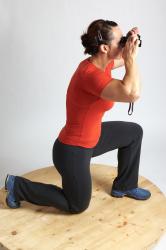 ANGELINA KNEELING POSE WITH SPYGLASS